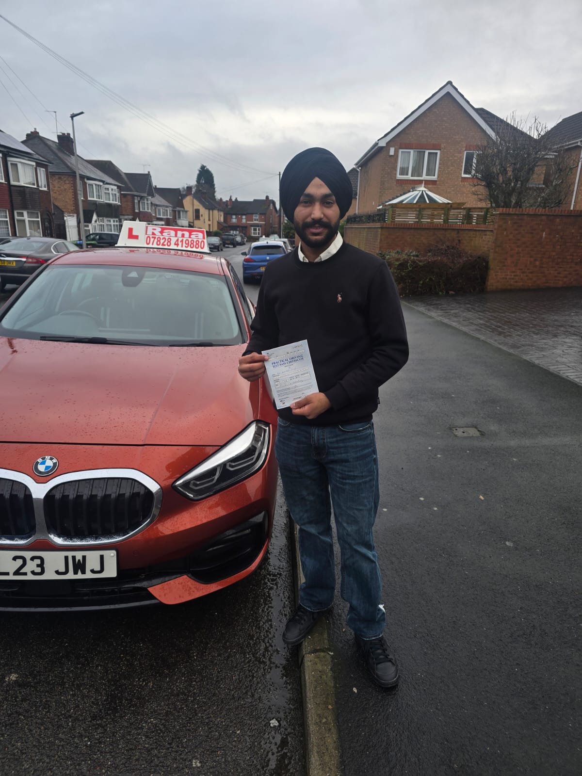 Successful student with driving pass certificate