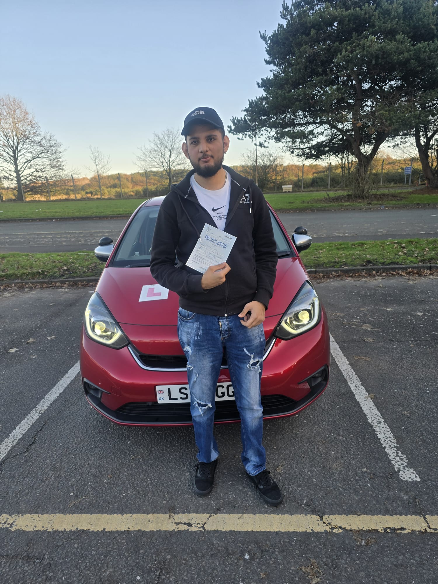 Successful student with driving pass certificate