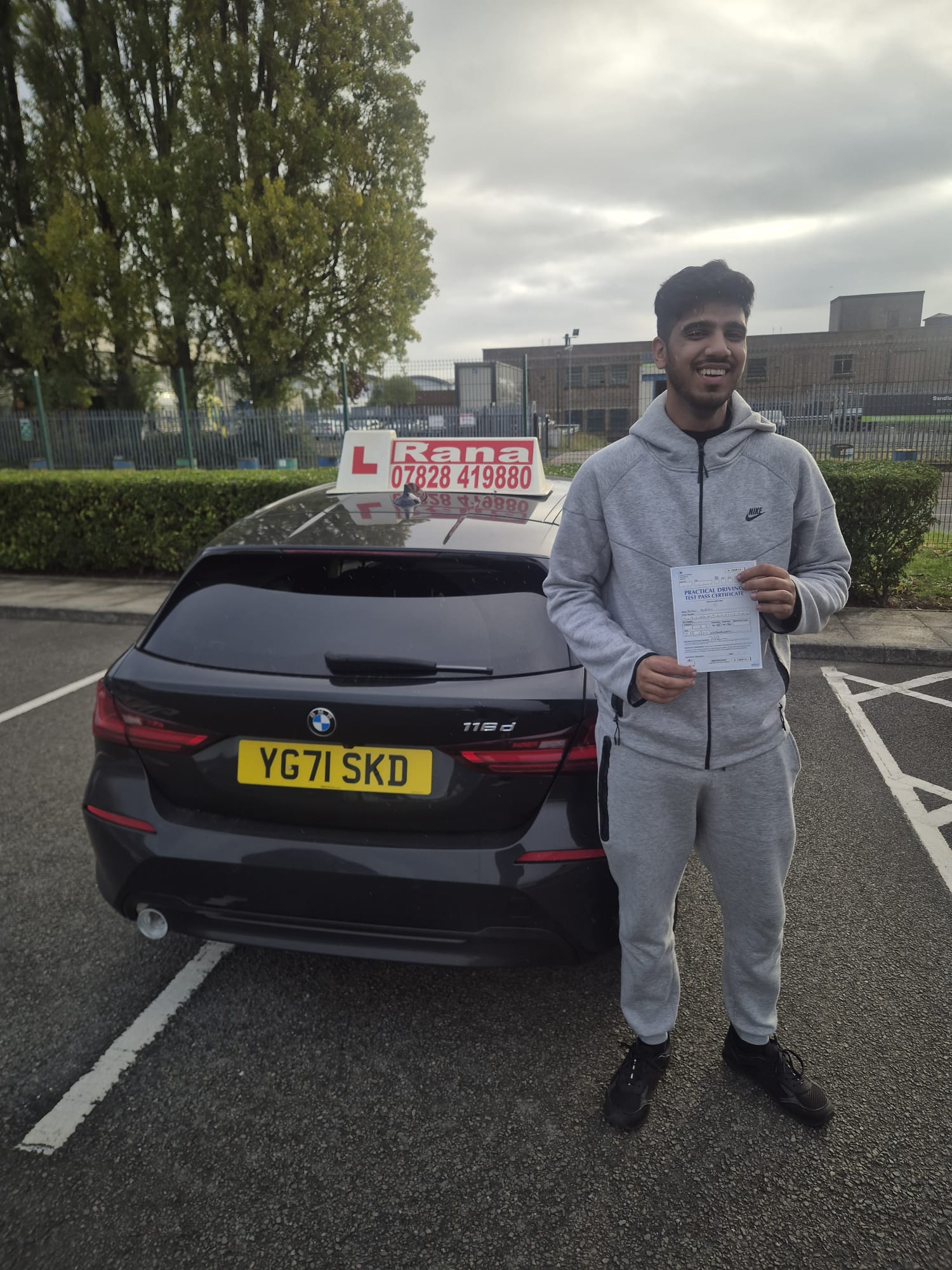 Successful student with driving pass certificate