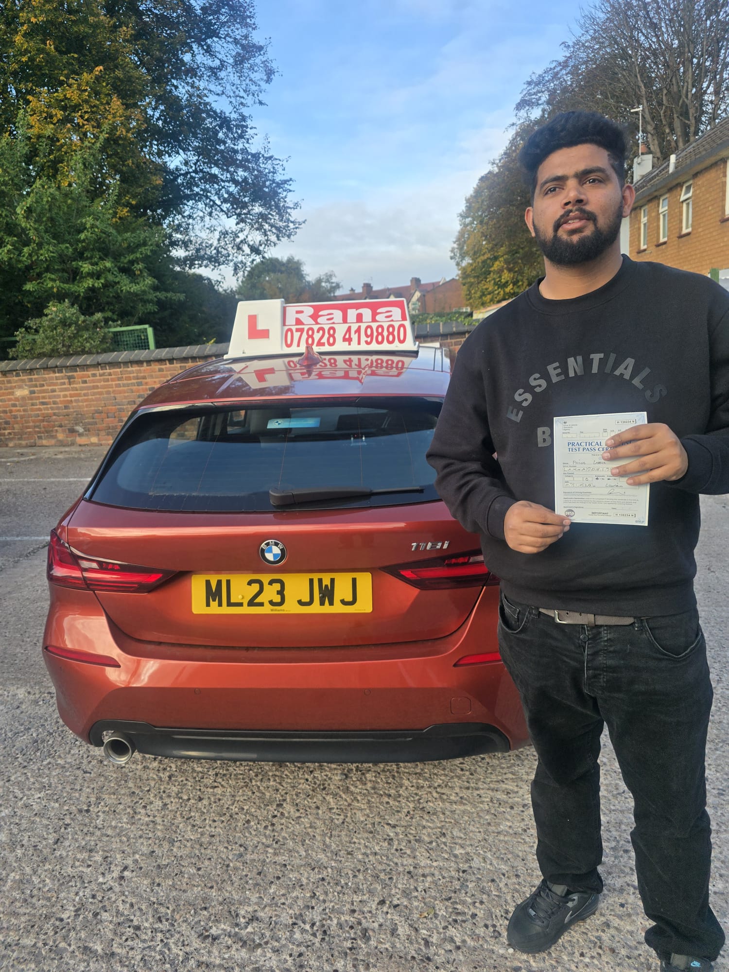 Successful student with driving pass certificate