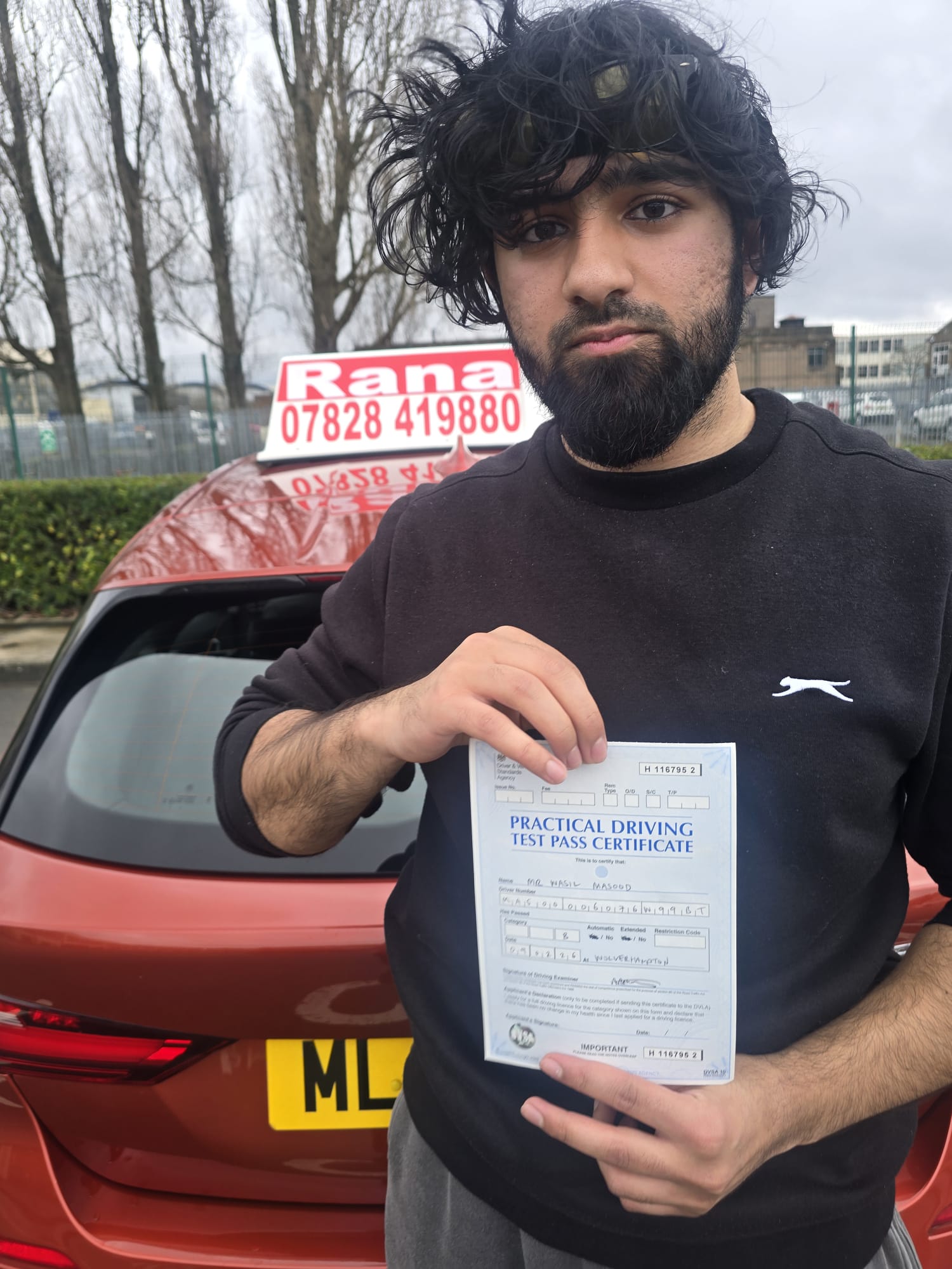 Successful student with driving pass certificate