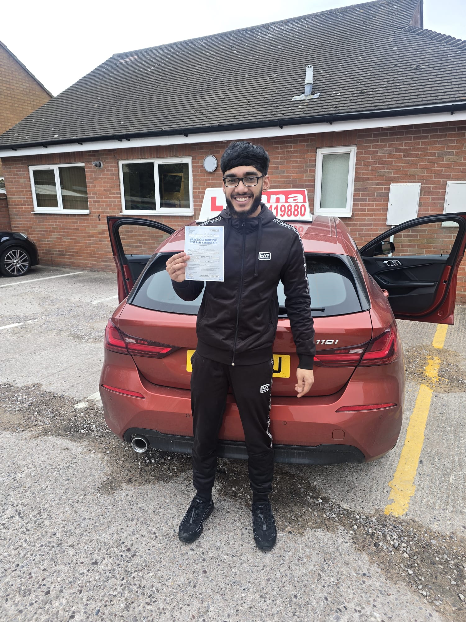 Successful student with driving pass certificate