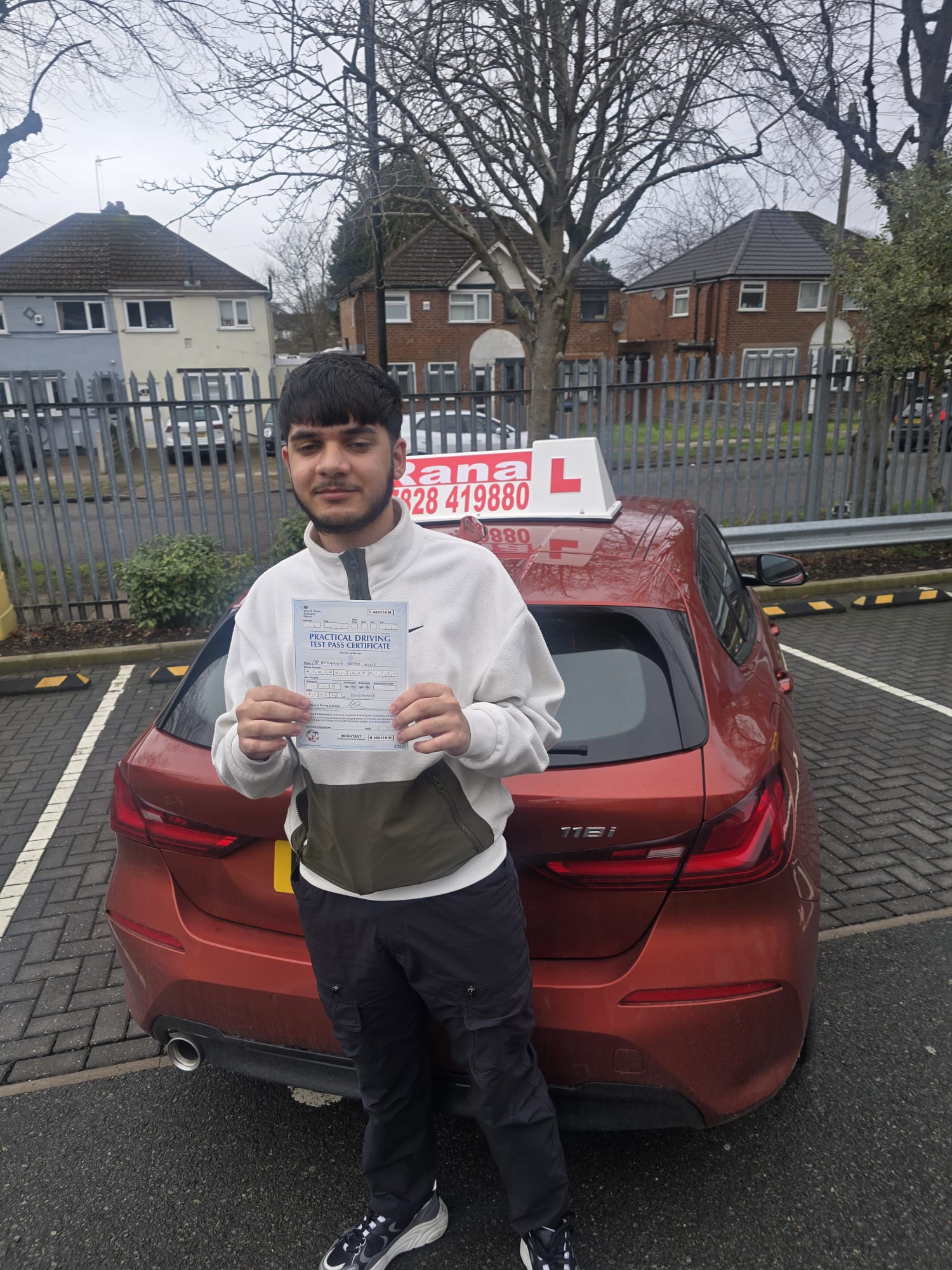 Successful student with driving pass certificate